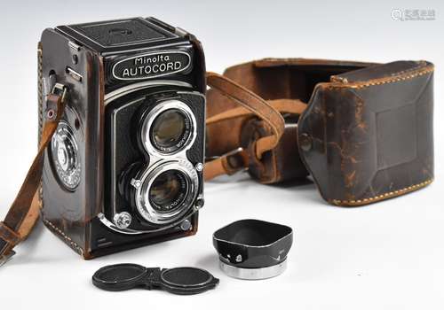 Minolta Autocord TLR camera with 75mm 1:3.5 lens, in leather...