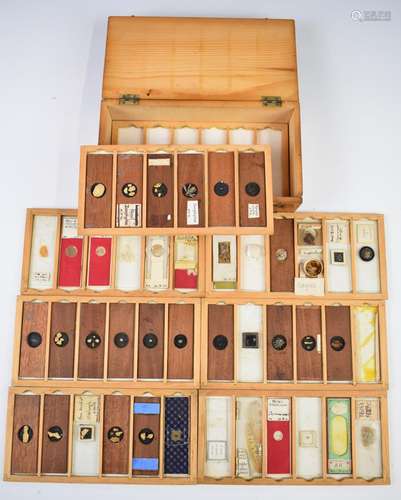 Case of approximately 42 late 19th or early 20thC microscope...