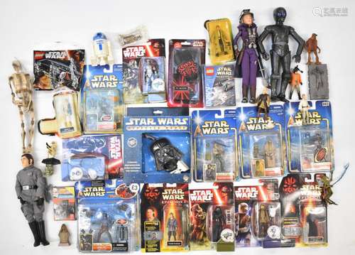 A collection of Hasbro Star Wars figures, loose and carded, ...