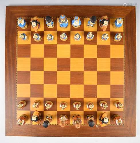 Studio Anne Carlton Alice in Wonderland chess set on wooden ...