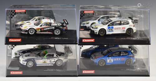 Four Carrera Evolution model slot racing cars including VW G...