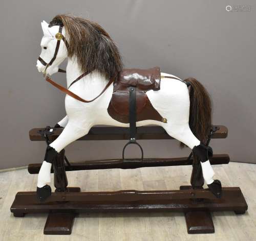 Carved wooded Rocking Horse with leather and metal fittings ...