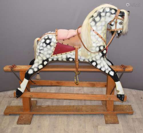 Carved wooden Rocking Horse with leather and metal fittings ...