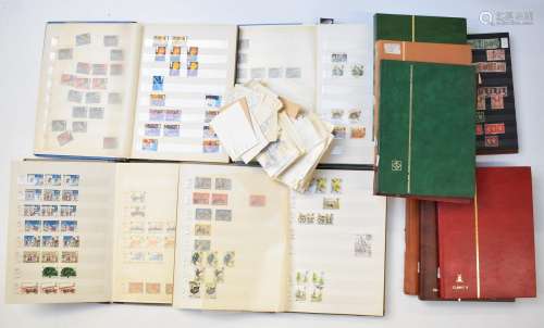 A mint and used GB stamp collection in thirteen stock albums...