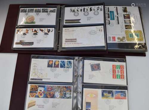 A collection of GB first day covers in three albums from Geo...
