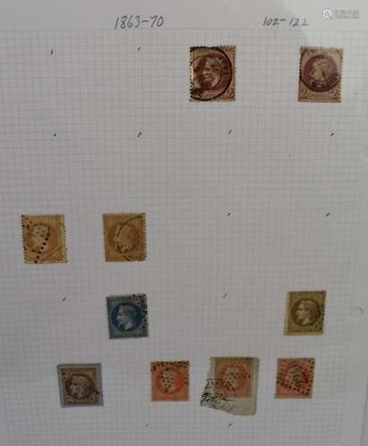 A used collection of stamps from France in three folders