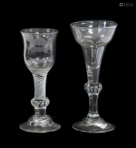 A Wine Glass, circa 1730, the pan-topped bowl on a ball knop...