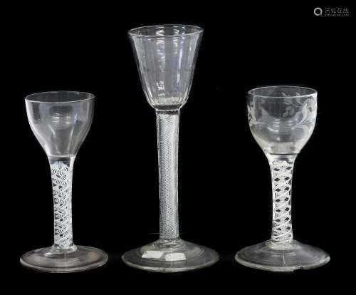 A Wine Glass, circa 1750, the semi-fluted rounded funnel bow...