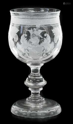 A Glass Goblet, 19th century, the tulip shaped bowl engraved...