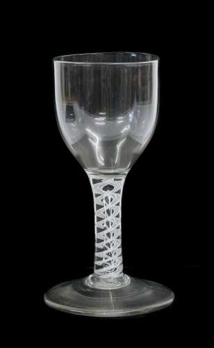 A Mixed Twist Wine Glass, circa 1750, to ovoid bowl on an op...