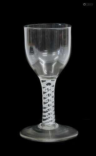 A Mixed Twist Wine Glass, circa 1750, to ovoid bowl on an op...