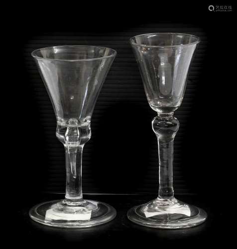 A Wine Glass, circa 1740, the rounded funnel bowl on a ball ...