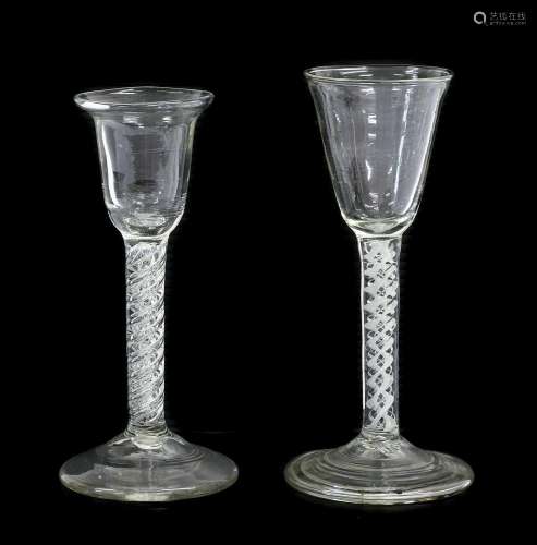 A Wine Glass, circa 1750, the rounded funnel bowl on a mixed...