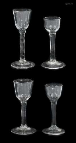 A Wine Glass, circa 1750, the rounded funnel bowl on ball kn...