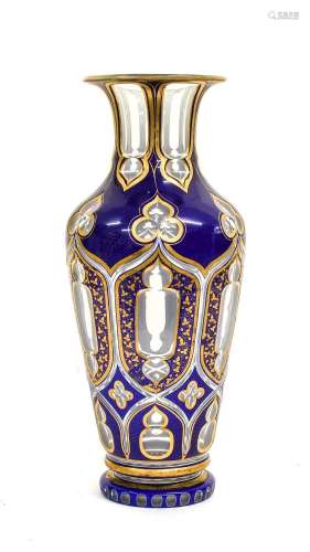 A Bohemian Blue Overlay Clear Glass Vase, circa 1870, of bal...