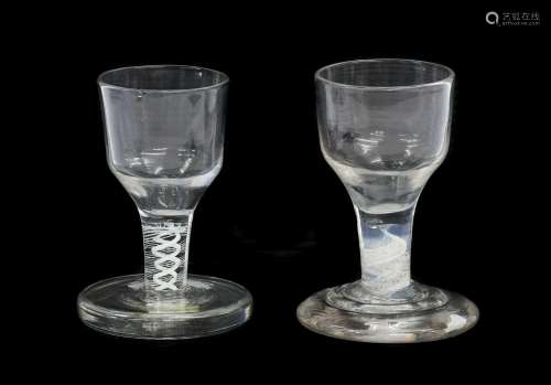 A Firing Glass, circa 1750, the ogee bowl on an opaque twist...