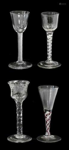 A Wine Glass, circa 1750, the ogee bowl on an opaque twist s...