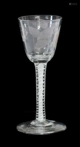 A Jacobite Wine Glass, circa 1750, the rounded funnel bowl e...
