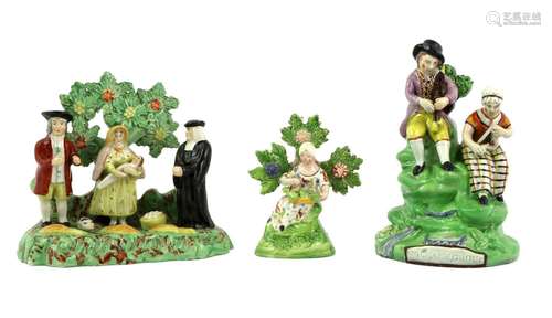 A Pearlware Figure Group, circa 1820, as a boy and girl play...