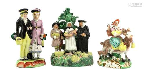 A Pearlware Figure Group, circa 1820, the Dandys on a scroll...