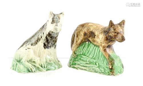 A Pearlware Model of a Wolf, circa 1800, standing on a grass...