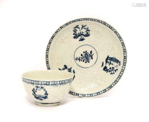 A Lowestoft Porcelain Tea Bowl and Saucer, circa 1765, paint...