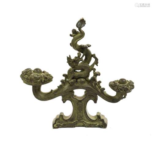 A Chinese Bronze Finial/Stand, in Archaic style, as a sinuou...