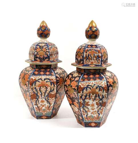 A Pair of Imari Porcelain Hexagonal Jars and Covers, Meiji p...