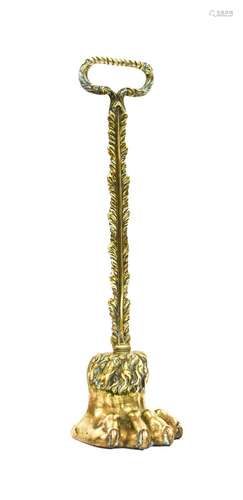 A Victorian Gilt Metal Door Stop, with feather cast spade ha...