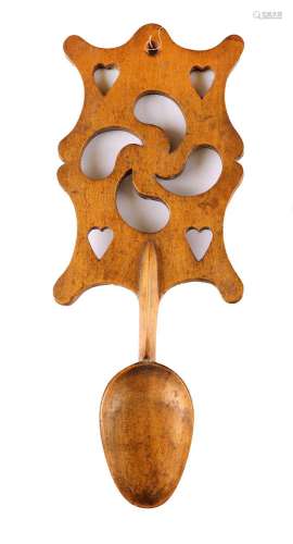 A Welsh Treen Love Spoon, 19th century, the cartouche shaped...