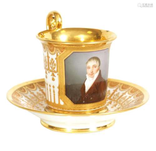 A 19TH CENTURY FRENCH PORCELAIN PORTRAIT CABINET CUP AND SAU...