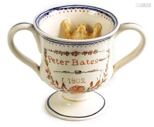 AN EARLY 19TH CENTURY CREAMWARE LOVING CUP inscribed PETER B...