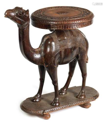 AN EARLY 20TH CENTURY CARVED ANGLO INDIAN TABLE