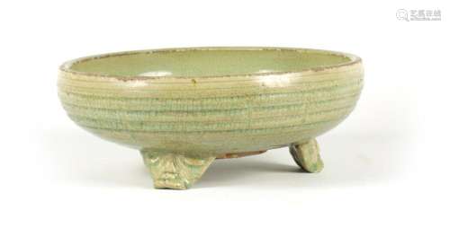 AN EARLY CELADON MING DYNASTY TRIPOD BULB BOWL