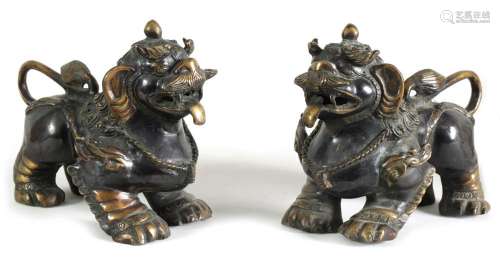 A PAIR OF BRONZE CHINESE DRAGON LIONS