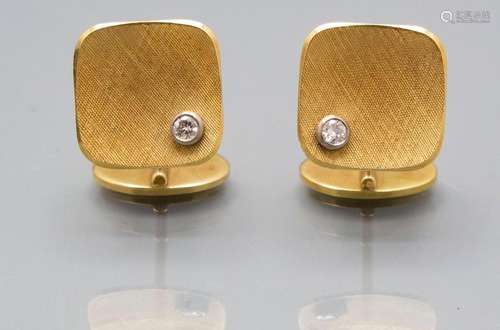 Paar Manschettenknöpfe mit Diamanten / A pair of 14 ct gold ...