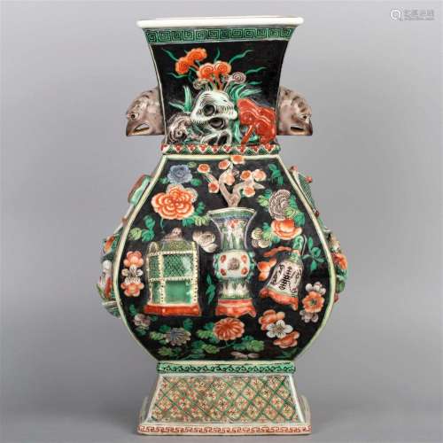 Famille-noire square-section vase decorated with the shape o...