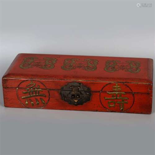 Red box with dragon patterns and the characters of 'Wan Shou...