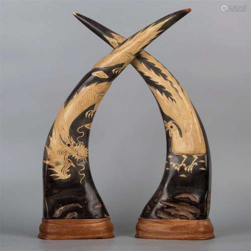 Horns carved with dragon and pheonix