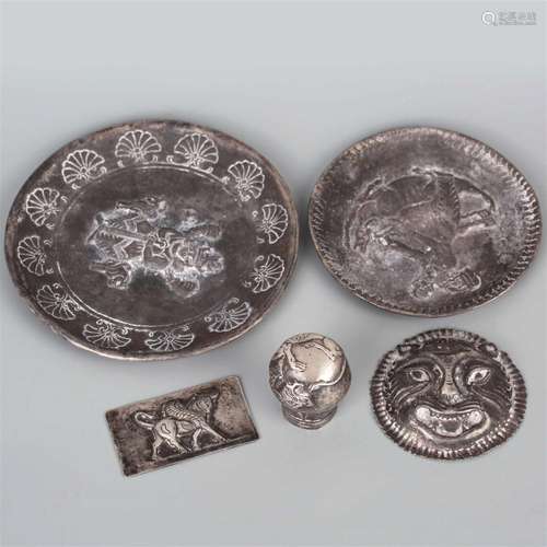 A collection of ancient Persian silverware