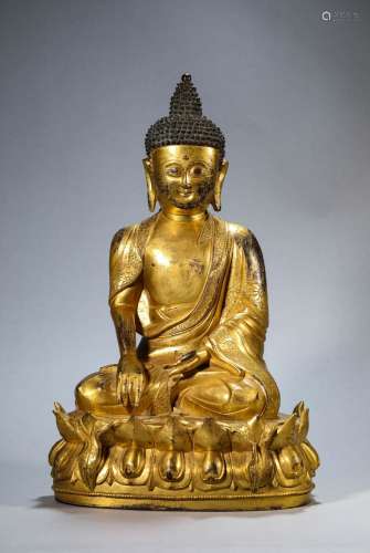 A GILT-BRONZE FIGURE OF SHAKYAMUNI.QING DYNASTY