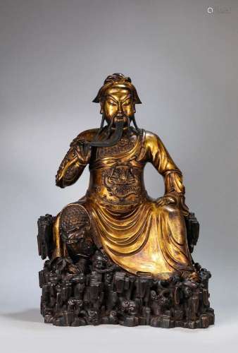 A GILT-BRONZE FIGURE OF SEATED GUANGONG.QING DYNASTY