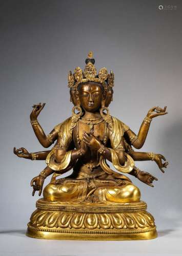 A GILT-BRONZE FIGURE OF EIGHT ARMS GUANYIN.QING DYNASTY