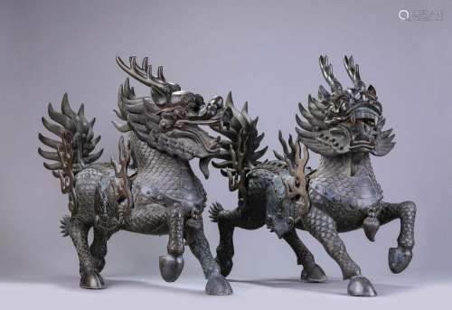 A PAIR OF BRONZE QILINS .QING DYNASTY