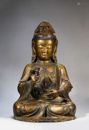 A GILT-BRONZE FIGURE OF SEATED GUANYIN.MING DYNASTY