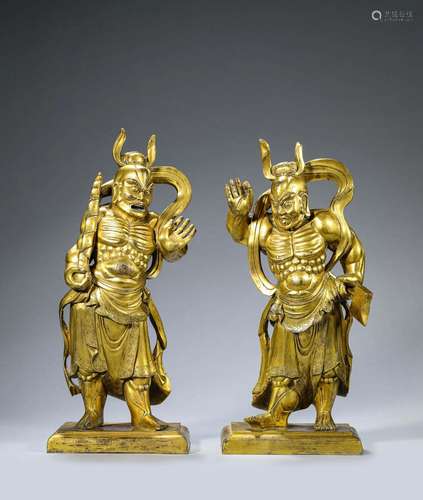 A PAIR OF GILT-BRONZE OF GUARDIANS