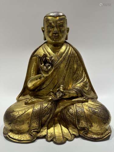 A GILT-BRONZE FIGURE OF GURU.YUAN DYNASTY