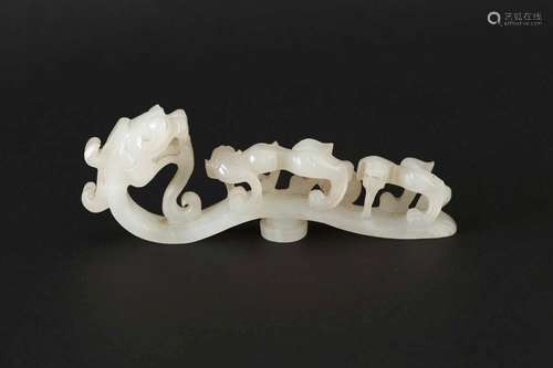 A CARVED WHITE JADE 'DRAGON' BELT HOOK.HAN DYNASTY