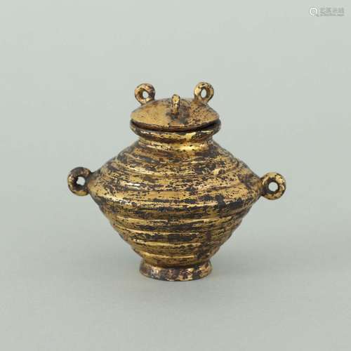 A GILT-BRONZE JAR AND COVER.HAN DYNASTY