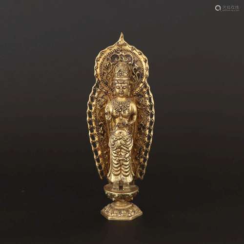 A GILT-BRONZE STANDING BUDDHA